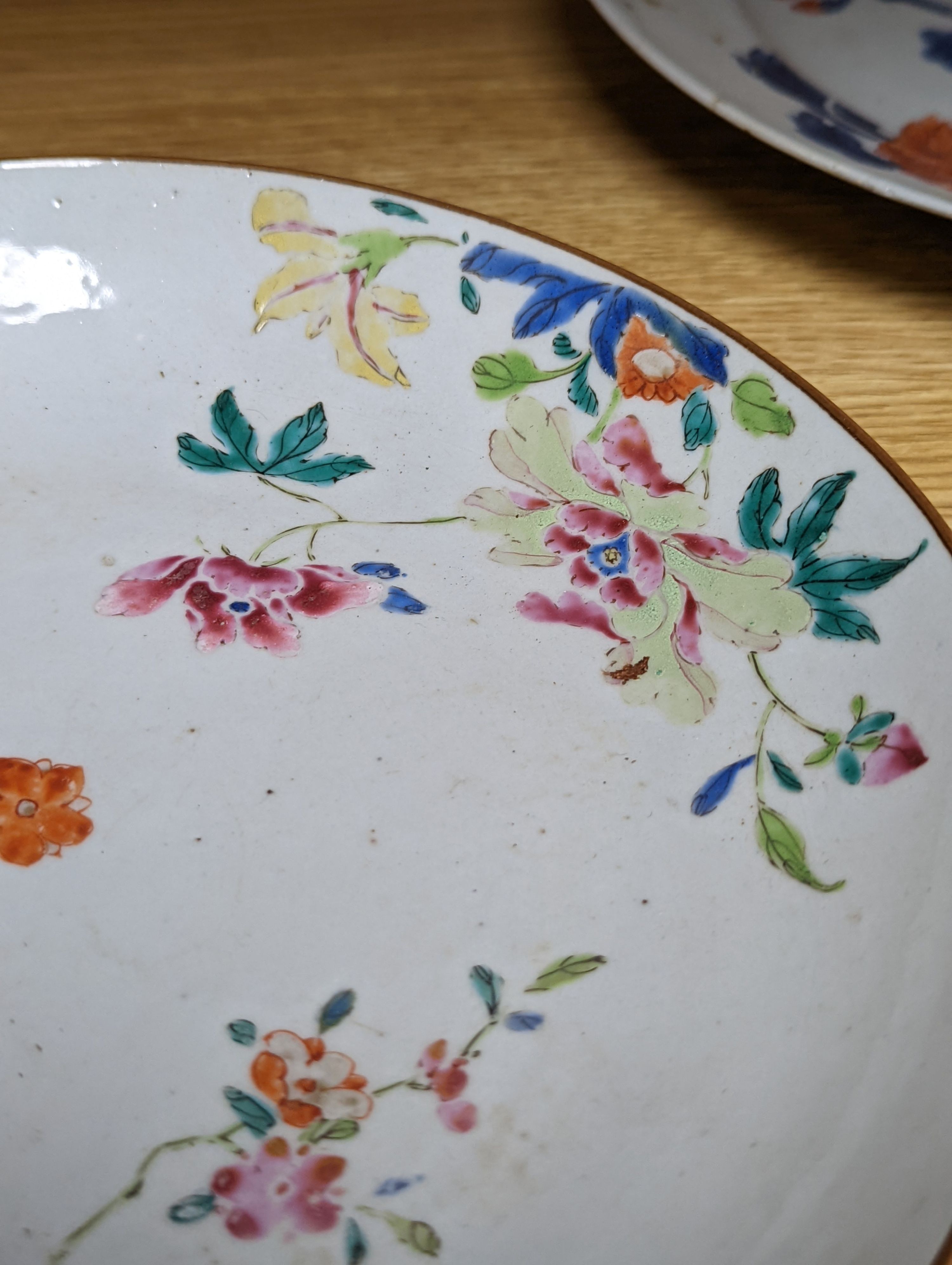 An 18th century Chinese famille rose dish, crackle-glaze stem cup, Beijing glass tea bowl and a Chinese Imari plate. Largest 24cm